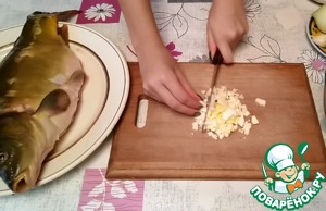 Фаршированный карп в духовке