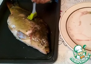 Фаршированный карп в духовке