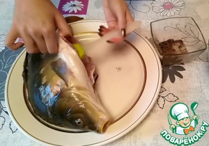 Фаршированный карп в духовке