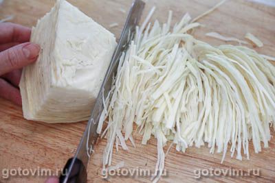 Крученики волынские из свинины с капустой, запеченные в сметане