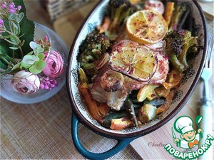 Морской окунь, запечённый с овощами