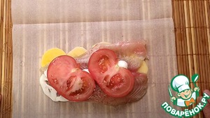 Запечённый пангасиус в пергаменте, в духовке