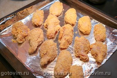 Куриные крылышки, жаренные в кокосовой стружке